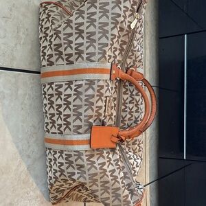 Michael Kors Monogram Travel Bag in Brown and Orange